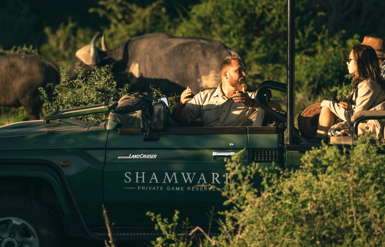 Sustainable Safaris Africa - Journeys - Luxury Eastern Cape Family Safari - Shamwari Game Drive Vehicle and Guide on Tourist Safari Game Drive