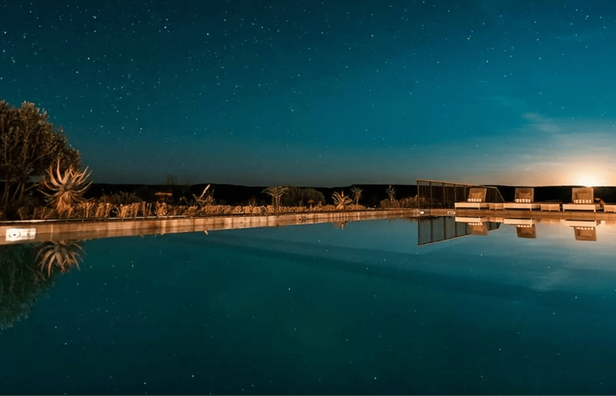 Sustainable Safaris Africa - Journeys - Luxury Eastern Cape Family Safari - Luxury Accommodation Swimming Pool at Night