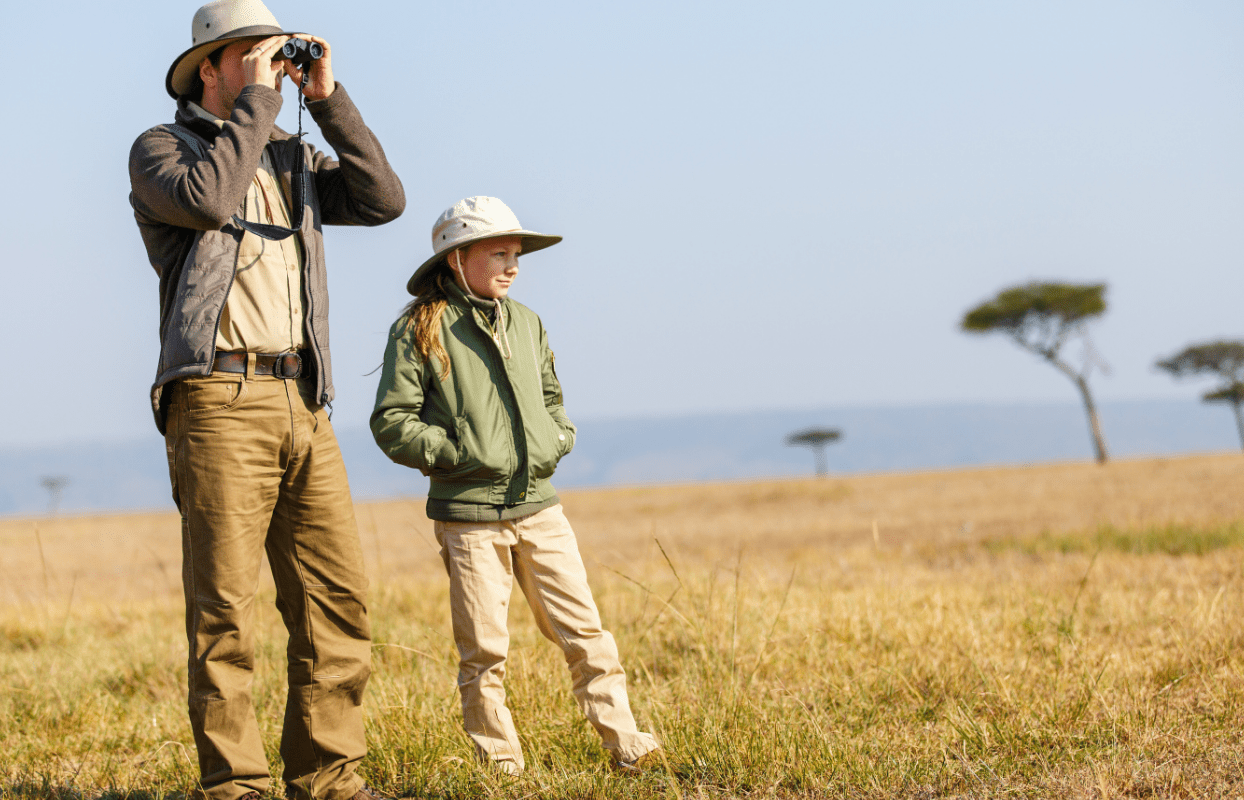 S003-IT1- Father and Child in the Bush Viewing with Binoculars Sustainable Safari Africa - Experiences - Walking Safaris in Africa - Journeys - Family Friendly Kruger Safari - Father and Child in the Bush Viewing with Binoculars