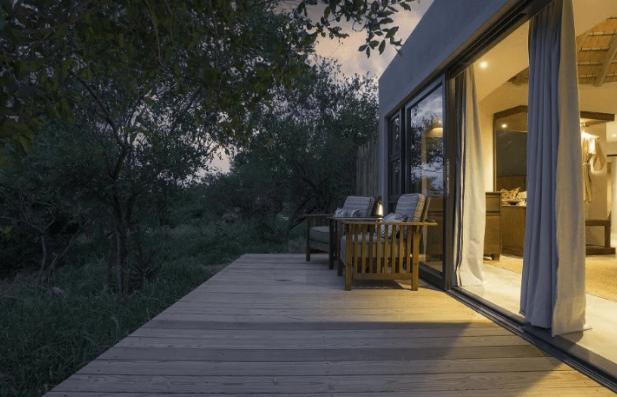 S002-IT1 - Bedroom Leading onto Wraparound Deck at Accommodation Sustainable Safaris Africa - Journeys - Luxury Kruger Safari - Bedroom Leading onto Wraparound Deck at Accommodation