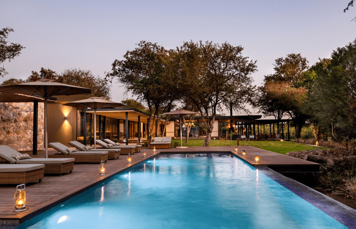 S002-IT2 - Accommodation Swimming Pool and Sun Bed Chairs Sustainable Safaris Africa - Journeys - Luxury Kruger Safari - Accommodation Swimming Pool and Sun Bed Chairs