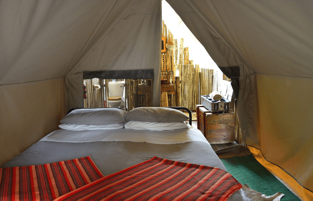 S004 - IT2 - Double Bed in Glamping Safari Tent Sustainable Safaris Africa - Journeys - African Glamping Safari - Double Bed in Glamping Safari Tent
